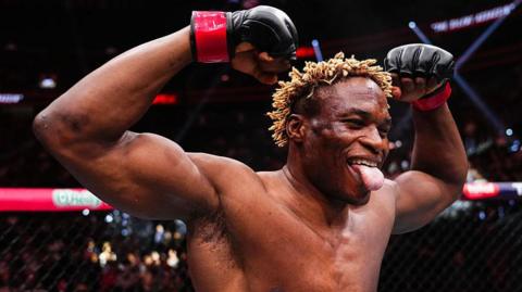 Ateba Gautier celebrates after a win in the UFC